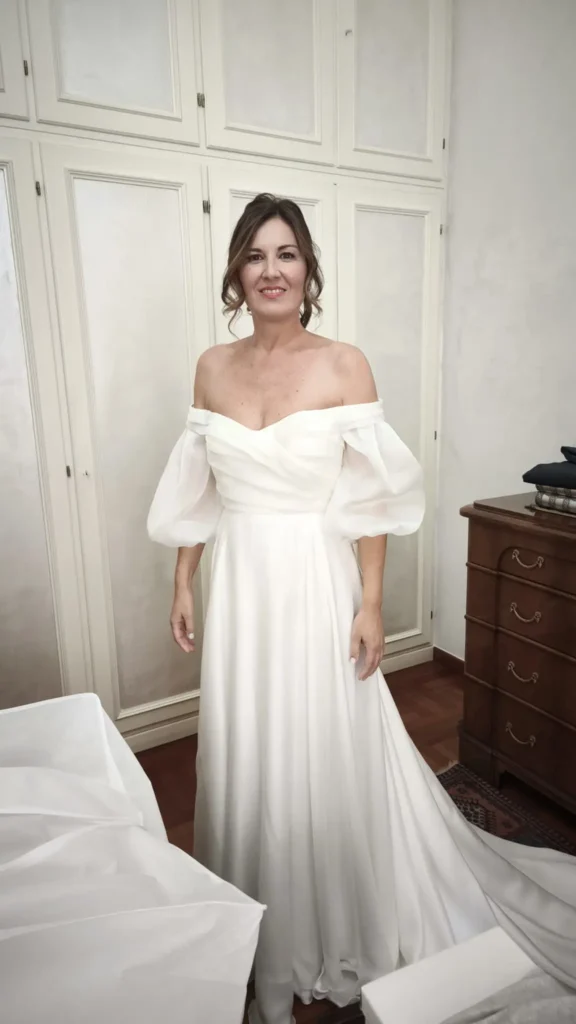 abito da sposa off shouder Menì